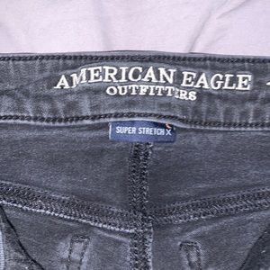 Black American eagle outfitters heavy distressed jegging size 4P